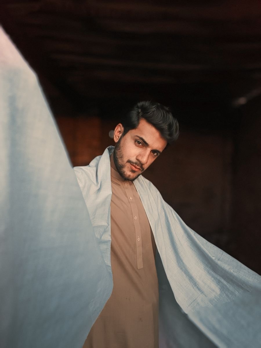 Moody portrait of a man wearing coustomer of qkzee tech